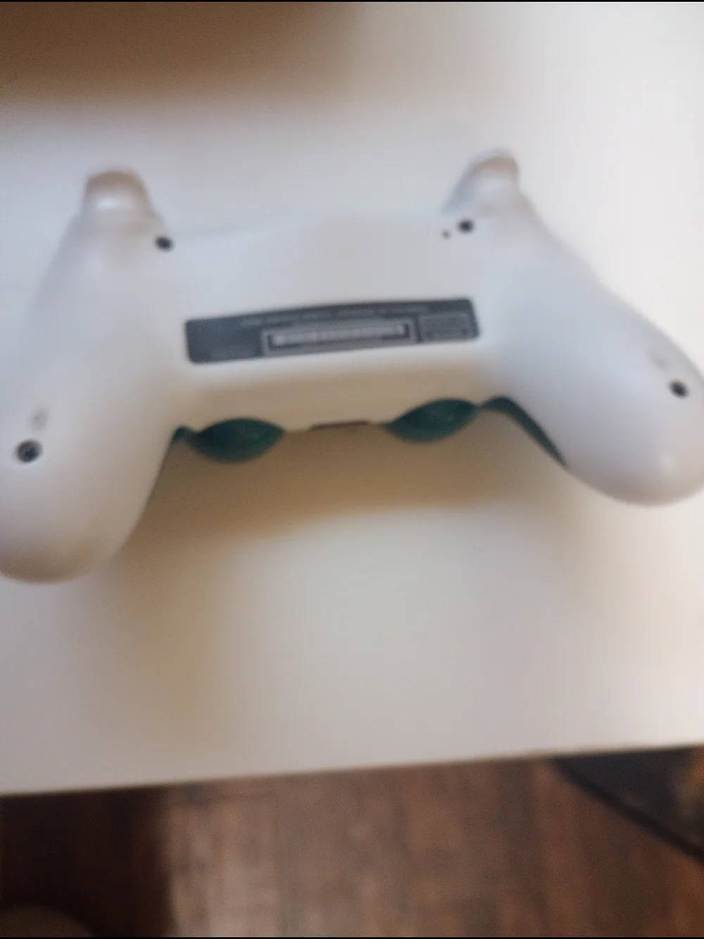 White Wireless Game Controller with Teal Accents